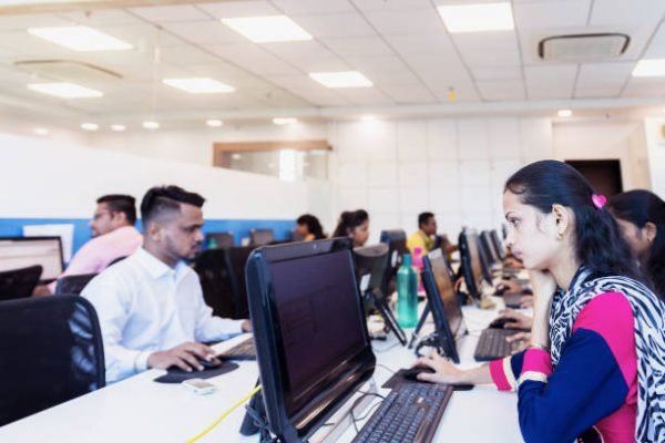 Corporate Business, Indian, Office - Business Executives working behind their office cubicles